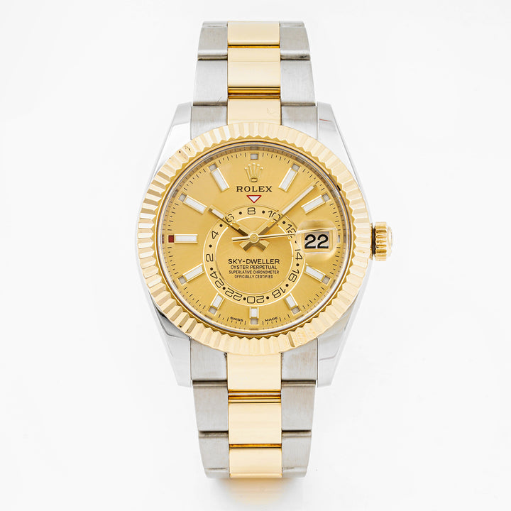 Rolex Sky-Dweller 42mm Stainless Steel & Yellow Gold 326933 Champagne Dial | Index hour markers, Fluted bezel