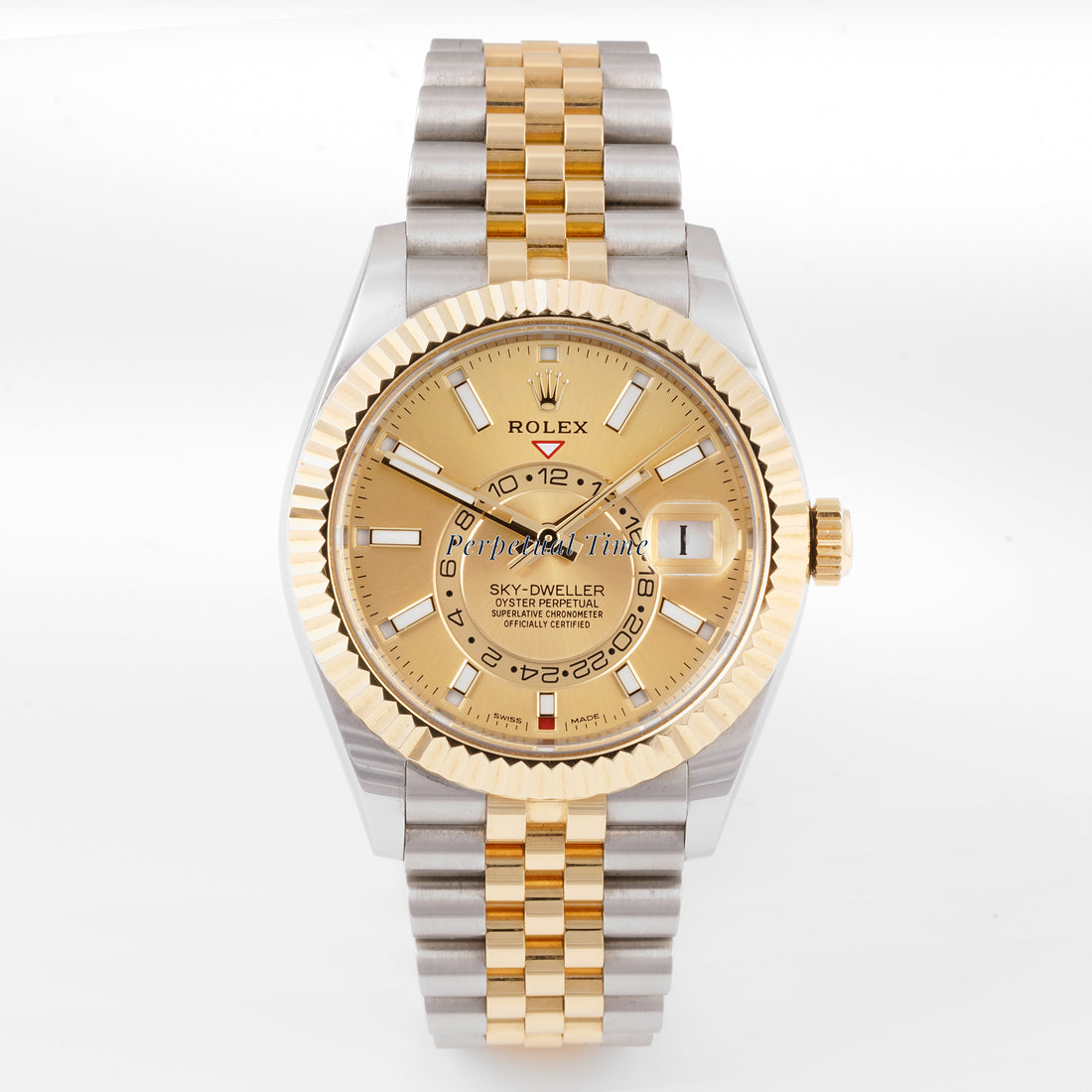 Rolex Sky-Dweller 42mm Stainless Steel & Yellow Gold 326933 Champagne Dial | Index hour markers, Fluted bezel