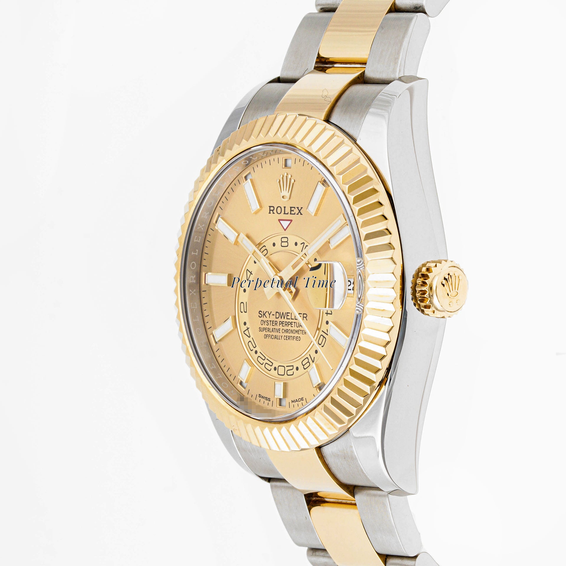 Rolex Sky-Dweller 42mm Stainless Steel & Yellow Gold 326933 Champagne Dial | Index hour markers, Fluted bezel