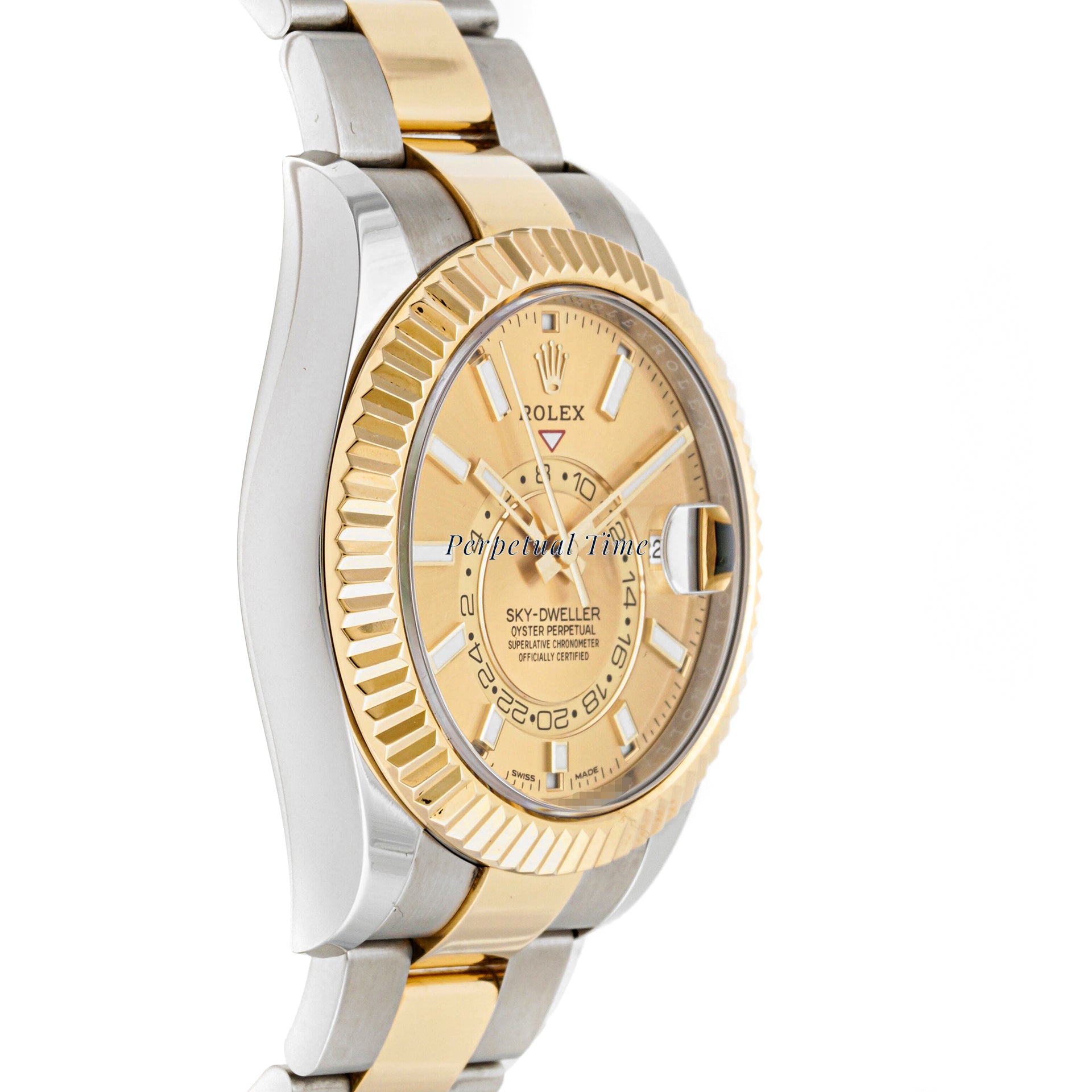 Rolex Sky-Dweller 42mm Stainless Steel & Yellow Gold 326933 Champagne Dial | Index hour markers, Fluted bezel