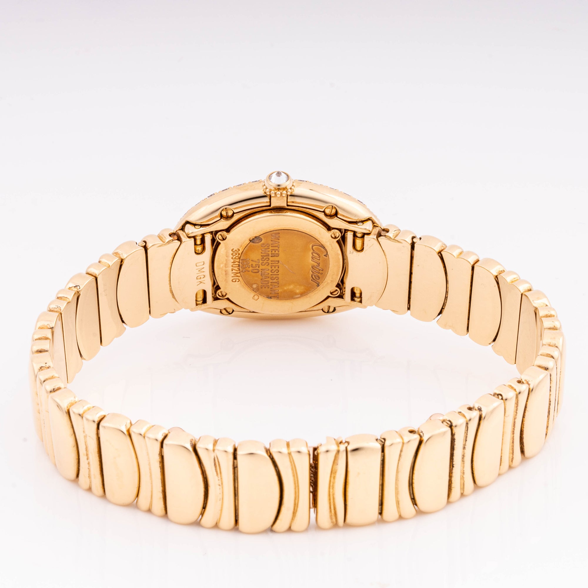 Cartier Baignoire 22.5 x 31 mm Yellow Gold 1954 Silver  Dial | Roman Numerals hour markers, Diamond bezel